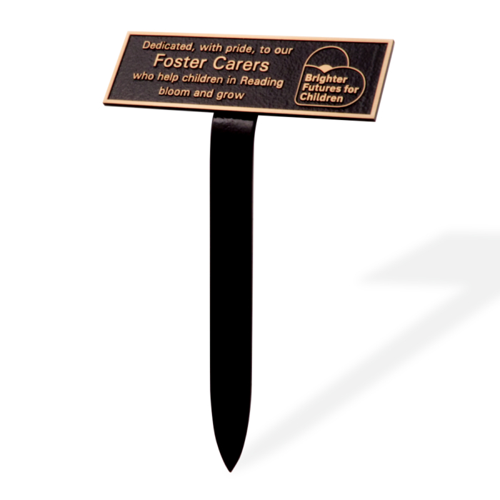 Cast bronze garden plaque with ground stake and custom motif.