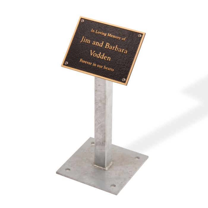 Bronze memorial plaque on heavy duty metal stand.