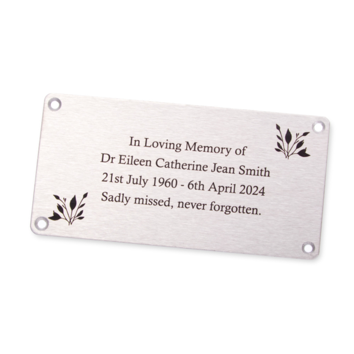 Commemorative plaque for Dr Eileen with engraved inscription and plant motifs